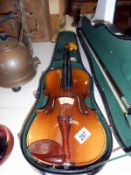 A Skylark brand violin with bow and case
