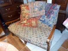 A cottage style 2 seater sofa