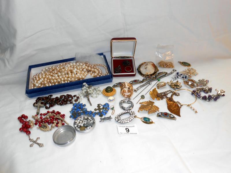 Quantity of costume jewellery inc. large cameo, brooch, rosary's, pearls etc.