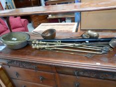 A quantity of brass & copper including fire irons & warming pan etc.