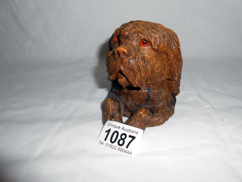 Carved figure head of a dog inkwell