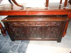 A carved oak chest
