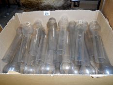 A quantity of oil lamp chimneys