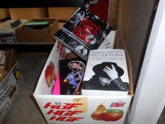 A box of books on singers, groups etc including The Rolling Stones,
