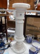 A reconstituted marble pillar that illuminates