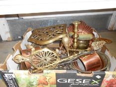 Box of brass and copper inc. candlesticks, cider measures, trivet etc.