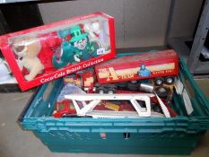 A box of mixed toys including A Team lorry & Coca Cola soft toys etc.