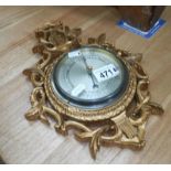 A gilt framed barometer