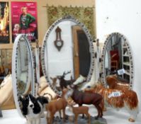 A 1950s white painted oval triple dressing table mirror