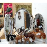 A 1950s white painted oval triple dressing table mirror