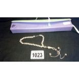 A set of silver prayer beads