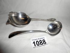 Silver tea strainer HM Sheffield 1960 approx. 55gm and small silver ladle HM Sheffield 1964 approx.