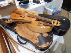 A Medieval fiddle & rebec with a quantity of bows & 2 violin cases