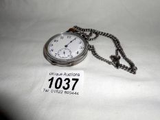 A silver pocket watch with silver double Albert chain