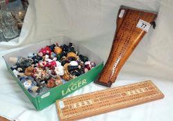 Quantity of novelty bottle stoppers and 2 cribbage boards