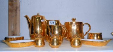 11 pieces of Royal Worcester gold coloured china