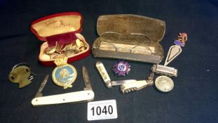 A good mixed lot including miniature mouth organ, cufflink's, penknives & wire framed glasses etc.