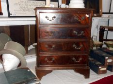 A mahogany 4 drawer chest of drawers