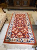 A small rug (210cm x 91.