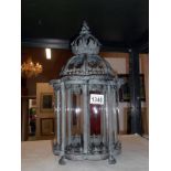 Verdigree metal and glass garden lantern