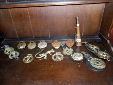 A quantity of horse brasses and regimental horn