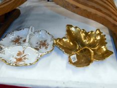 A fine German porcelain hors d'oeuvres dish and similar Portugese dish