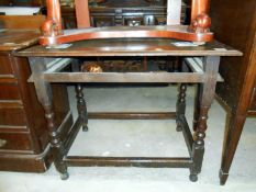 A Georgian oak side table
