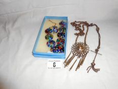 Albertine, ornate necklace etc.