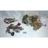 A quantity of Military items including badges & sweetheart brooches etc.