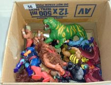 A collection of He-Man, Star Trek, Star Wars action figures etc.