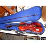 A violin for restoration with case