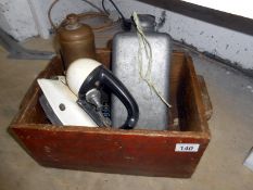 Old wooden box containing Tilley pressure iron,