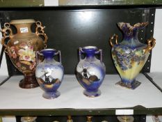 Pair of vases and 2 others