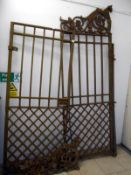 Pair of large 19th century iron gates Height 75.5" to top of the flat, height 93.