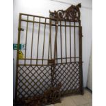 Pair of large 19th century iron gates Height 75.5" to top of the flat, height 93.