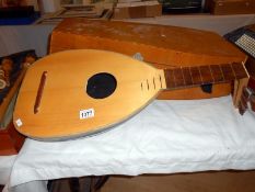 A lute with case (no strings)