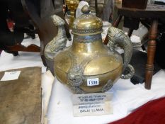 Brass Tibetan teapot with a note saying property of former Dalai Llama