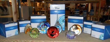 7 boxed Caithness glass paperweights