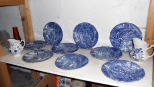 10 Wedgwood side plates and 2 blue and white jugs