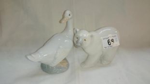 A Lladro polar bear and a Nao (by Lladro) goose