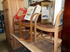 Three 1970s Hoop Arm dining chairs