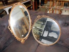 2 framed mirrors