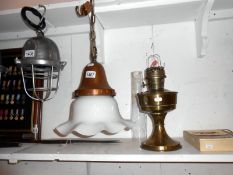 An Edwardian hanging lamp with copper fittings and an Aladdin parafin lamp