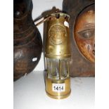 A brass Miner's lamp The Protector Lamp Lighting C L Eccles Manchester