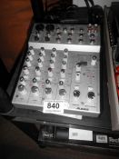 An Alesis multimix unit with manual & supply