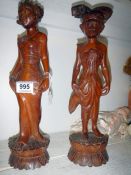 A pair of African wood carvings