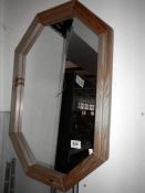 A pine wall mirror
