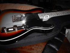 A Trev Wilkinson 'Fretking JD' electric guitar with soft case
