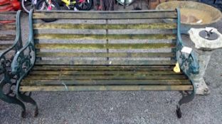 A cast iron garden bench