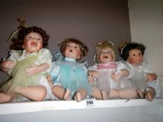 4 porcelain baby dolls